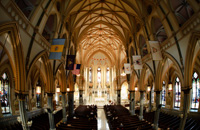 wide photography of a beautiful church during a wedding ceremony
