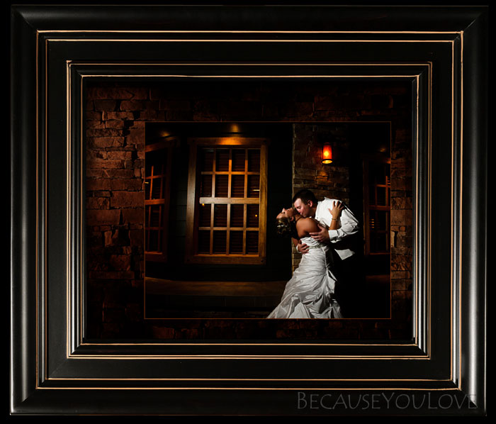 bride and groom embrace in a romantic portrait as framed wall art.