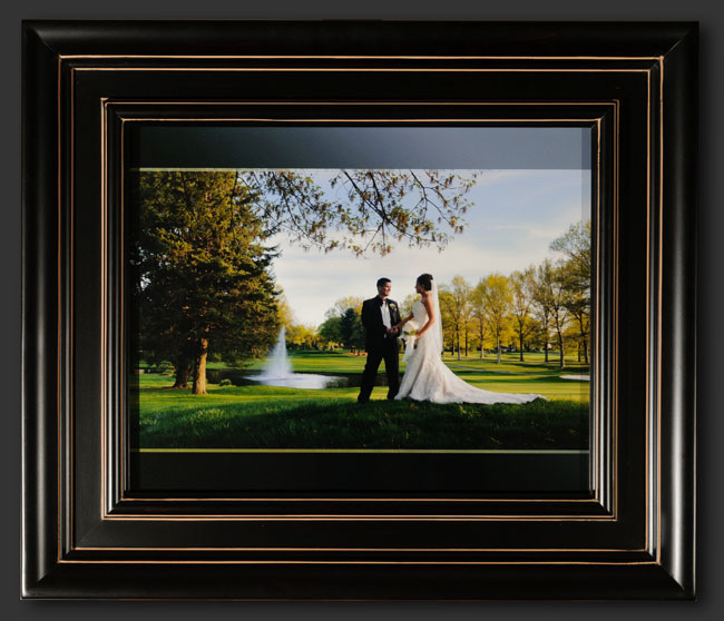 this romantic wedding portrait of the bride and groom has been framed under glass